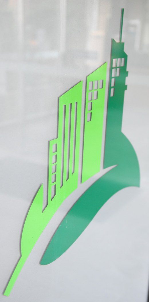 Dougherty Apartments logo on glass